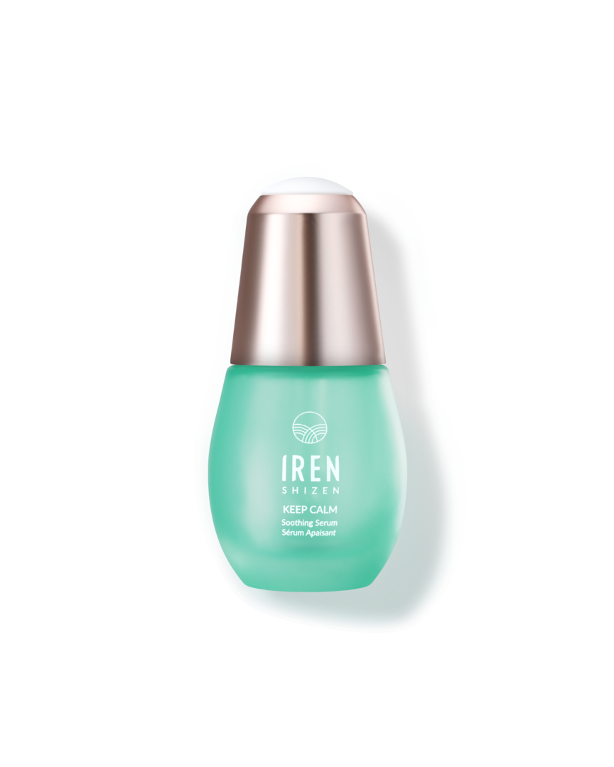 A customized bottle of IREN Shizen KEEP CALM Soothing Serum on a black background.