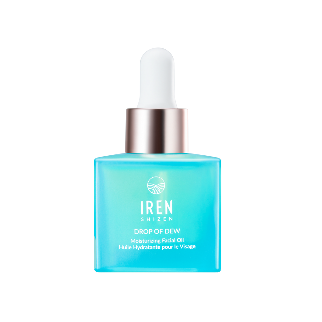 A bottle of custom IREN Shizen SAMPLE Facial Oils on a black background.